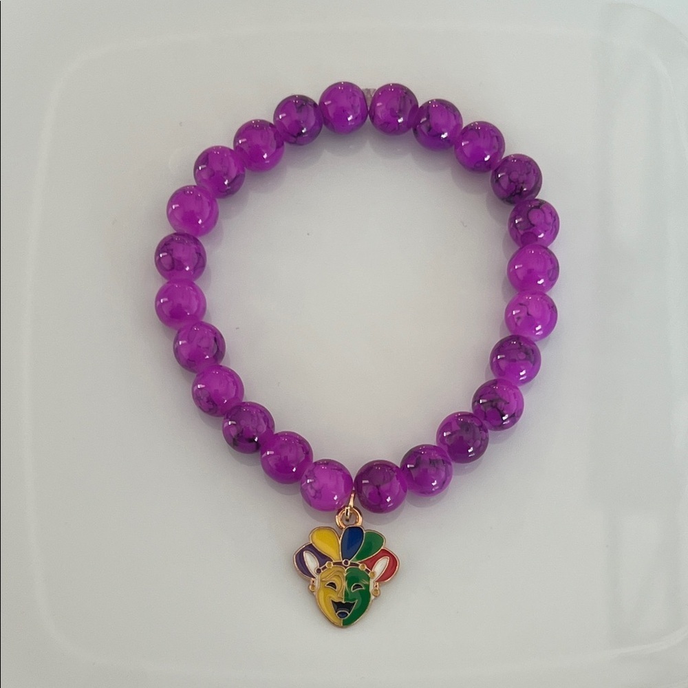 Purple Beaded Bracelet with Colorful Charm